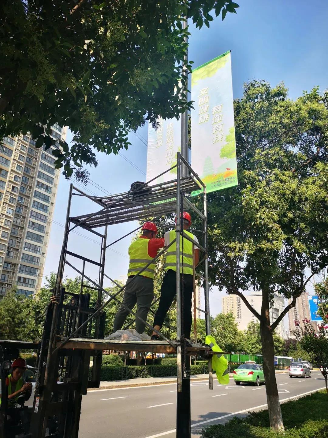 灯杆旗公益广告为创建文明城市营造良好氛围